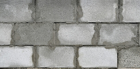 Cinder block wall under construction. Building block wall.