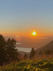Golden Sunset Over Alpine Lakes and Forests
