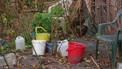 Rainwater Collected in Plastic Garden Buckets