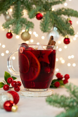 A mug of red drink with a star on it