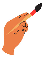 Paintbrush in human hand. Artist working. Painter drawing