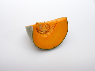 Pumpkin slices on a white background