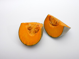 Pumpkin slices on a white background