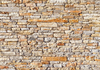 A wall built of flat stones