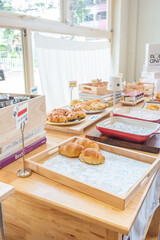 Fresh Baked Shio Pan or Japanese sea salt butter bread rolls in bakery shop,Homemade pastry with sesame,japan or korea bakery shop,copy space.