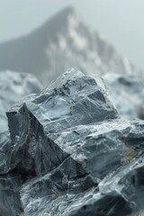 Obraz premium A close-up of a rock with a mountain in the background, suitable for use in travel or outdoor-themed projects