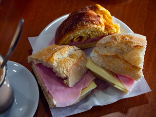Delicious sandwiches with ham and cheese closeup