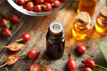 Rose hip essential oil in a brown glass bottle