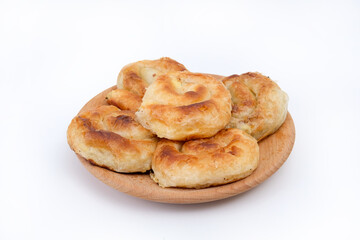 Burek - a delicious pie on a wooden plate
