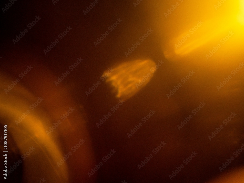 Wall mural abstract bokeh background with warm color. digital background for design. lens flare and light glow.