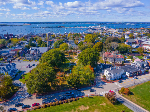 Touro Park aerial view including Windmill Tower with Newport Harbor at the background, city center of Newport, Rhode Island RI, USA. 