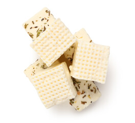 Delicious cut feta cheese and spices on white background