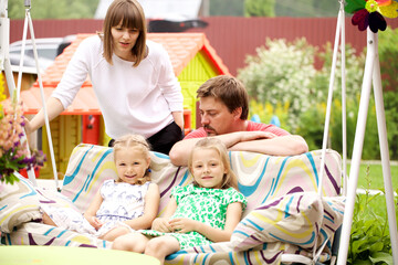 Obraz premium Portrait of a young family with two children