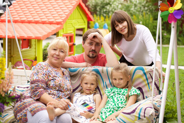 Portrait of a young family with two children