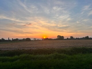 colorful sunrise over the field