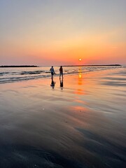 Fototapeta premium people walking on the beach