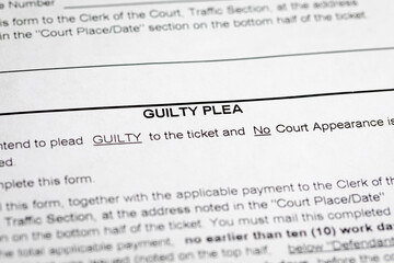 Traffic ticket with guilty plea form. Traffic citation, fine and court concept.