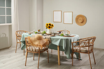 Served dining table with beautiful sunflowers, floral decor and candles