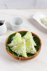 Lupis is a typical Indonesian food, especially in Java. Lupis is made from cooked glutinous rice and then wrapped in banana leaves. perfect for recipe, article, catalogue, or any commercial purposes.