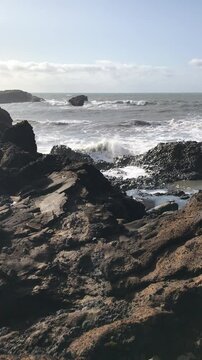 waves crashing on rocks