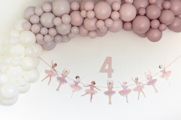 Balloon garland and ballerina decoration for 4th birthday party