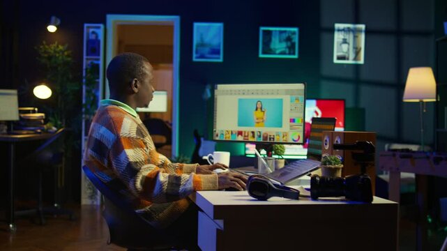 Freelance graphic designer working from home office on editing photos with advanced digital tools, showing the versatility of online work in the creative industry. Digital art retouching. Camera B.