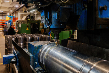 Working CNC milling machine with liquid coolant