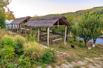 A small village with a few tables and a few buildings