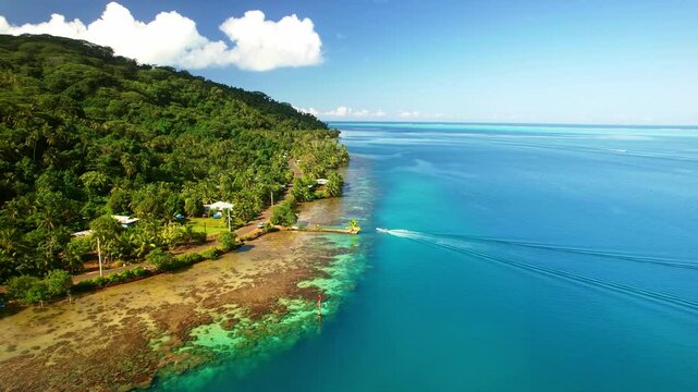 Drone Tahiti. Aerial view of Tahaa island coastline, lagoon and clear ocean water in French Polynesia. Exotic travel vacation getaway, famous tourism romantic honeymoon destination. 