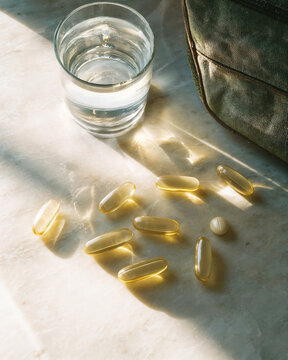 Wellness Morning Routine: Vitamin Supplements with Water - Health Still Life