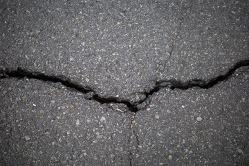 Asphalt cracks, road surface damage due to earthquake in Indonesia