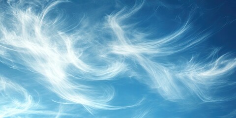Obraz premium A lovely blue sky featuring light, delicate clouds.