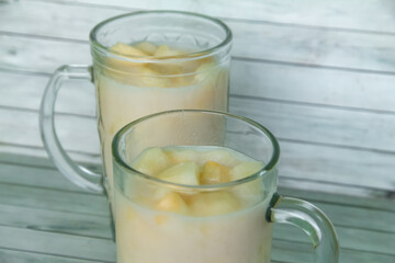 Drink from Suri Cucumber and fresh coconut milk, suri cucumber or Cucumis melo L. var. Naudin reticulatus is the fruit of a creeping plant with a fragrant aroma