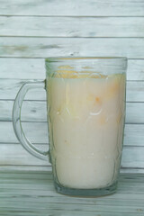 Drink from Suri Cucumber and fresh coconut milk, suri cucumber or Cucumis melo L. var. Naudin reticulatus is the fruit of a creeping plant with a fragrant aroma