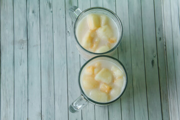 Drink from Suri Cucumber and fresh coconut milk, suri cucumber or Cucumis melo L. var. Naudin reticulatus is the fruit of a creeping plant with a fragrant aroma
