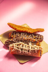 Crispy banana cake, sweet banana cake with sweet topping on a Pink background