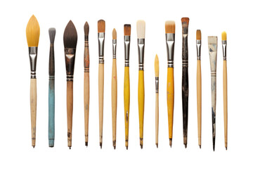 Fototapeta premium A set of assorted artist's paintbrushes arranged neatly on a white surface, featuring various shapes and sizes including flat, round, isolate on a white background.