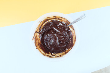 Top view of chocolate batter with copy space on background for baking concept.