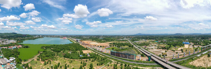 New construction site with crane and mechanical equipments on blue sky background, Infrastructure of high-speed train construction site of Chinese made FuxingHao, base from CR400AF for transportation.