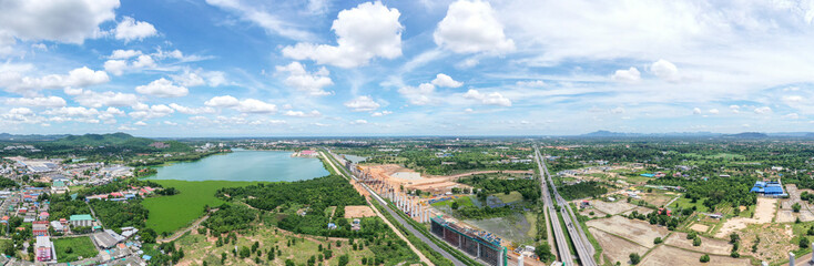 New construction site with crane and mechanical equipments on blue sky background, Infrastructure of high-speed train construction site of Chinese made FuxingHao, base from CR400AF for transportation.