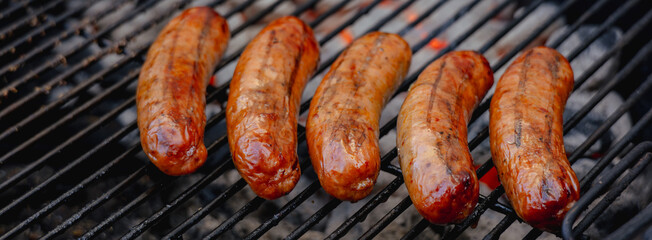 Sausages on charcoal grill bbq