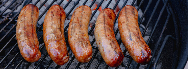 Sausages on charcoal grill bbq