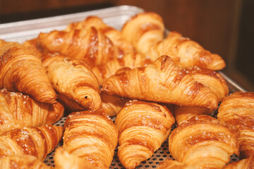 a picture of a bakery with a croissant