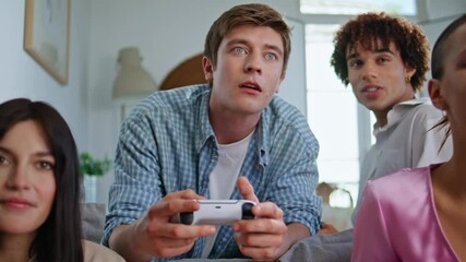 Competitive player enjoying videogame at sofa closeup. People playing console