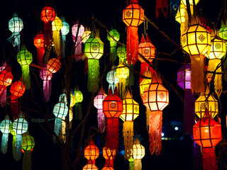 Colorful Lanna paper lanterns hang in Chiang Mai. Popular lantern festival during Loy Krathong in northern Thailand. Traditional Yi Peng paper lantern. The Hundred Thousand Lantern Festival.