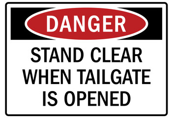 Truck safety signs stand clear when tailgate is opened