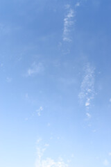 beautiful blue sky and white fluffy group of clouds with sunrise in the morning, natural background