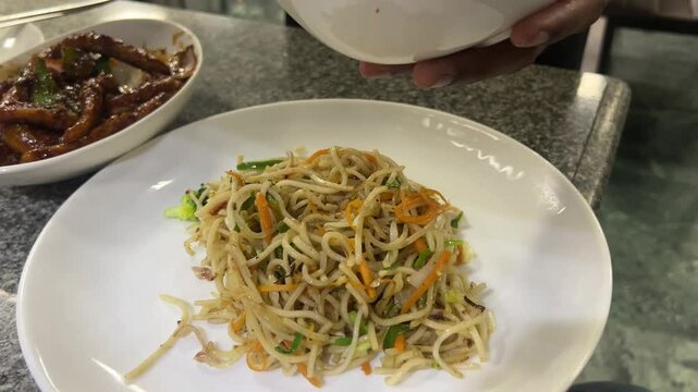 Vegetable chow mein prepared in Indian style