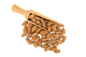 Wooden scoop overflowing with almonds isolated on white background