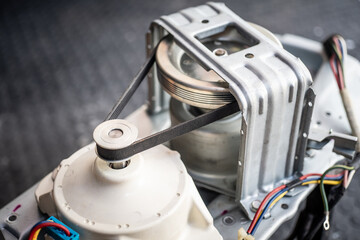 top load washing machines moter drive and belt ,washing machine repair concept